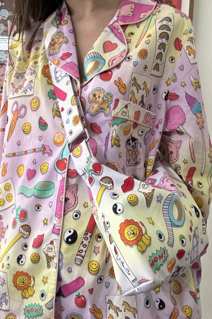 Karen Mabon Stationery print cotton pyjama set with the matching shoulder bag