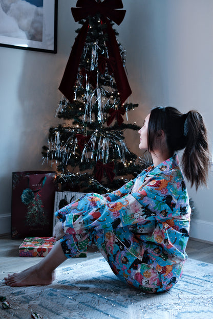 Cats' Christmas Morning rainbow pyjamas, side view