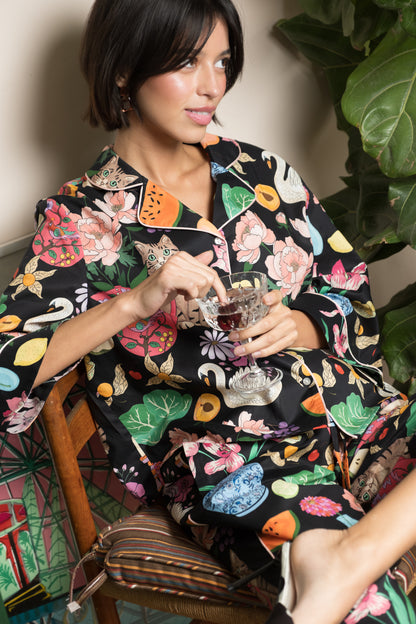 Midnight Tabletop organic cotton pyjama set worn at home, relaxed lifestyle shot
