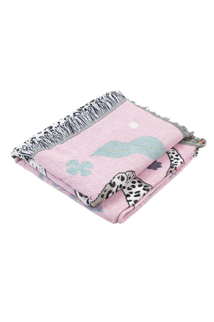 Product photo on white background of pink snow leopard blanket folded in a square