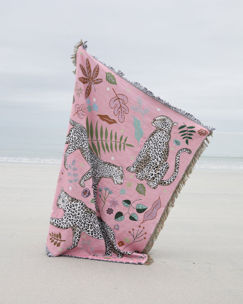 Snow Leopard Blanket on the beach 